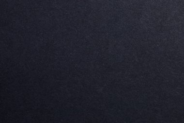 Bir sürü deseni olan siyah bir arkaplan. Doku çok ince ve arka plan neredeyse siyah, desenli origami kağıt fon.