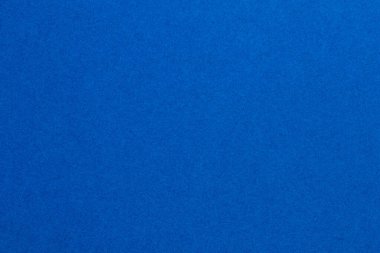 Beyaz noktaların etrafa saçıldığı mavi bir arka plan. Arkaplanın mavi rengi canlı, desenli origami kağıt arkaplanıdır