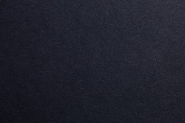 Beyaz benekli siyah bir arka plan. Arkaplan koyu renkli ve beyaz lekeler etrafa saçılmış, origami kağıtlı arka plan.