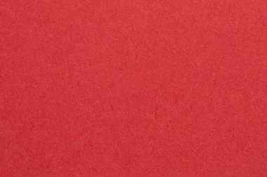 Beyaz çizgili kırmızı bir arkaplan. Arkaplan, görüntünün ana odak noktasıdır, desenli origami kağıt arkaplanı