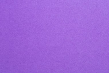 Ortasında beyaz nokta olan mor bir arkaplan. Arka plan morun derin bir tonu, neredeyse kraliyet mavisi, ve beyaz nokta küçük ve zar zor görülebilen, dokulu origami kağıt zemin.