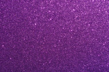 Pırıl pırıl mor noktalı mor bir arka plan. Noktalar arkaplana dağılmış, hareket ve derinlik hissi yaratıyor. Genel efekt görsel olarak çarpıcı.