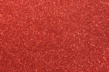 Parlak kırmızı noktalı kırmızı bir arka plan. Arka plan koyu kırmızı bir renktir, ve noktalar küçük ve parlaktır, parlak bir etki yaratır. Görüntünün çok fazla dokusu ve derinliği var.