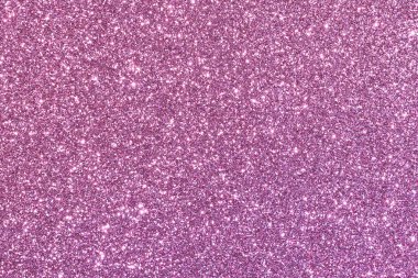 Pembe bir arka plan ve parlak bir doku. Parlak dokusu, resme parlak ve büyüleyici bir görünüm verir.