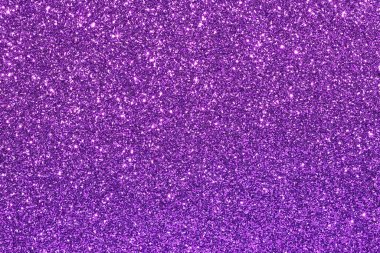 Pırıl pırıl mor noktalı mor bir arka plan. Arka plan morun koyu tonu, neredeyse kraliyet mavisi, ve noktalar morun açık tonu, neredeyse lavanta rengi.