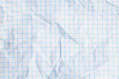 Buruşmuş mavi grafik kağıdının arkaplanı.