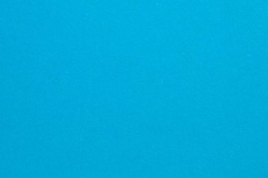 Beyaz çizgili mavi bir arka plan. Arkaplan, görüntünün ana odak noktasıdır, desenli origami kağıt arkaplanı