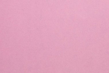 Ortasında beyaz nokta olan pembe bir arka plan. Arka plan çok yumuşak ve pürüzsüz. Beyaz nokta küçük ve zar zor görülebilen origami kağıdıdır.