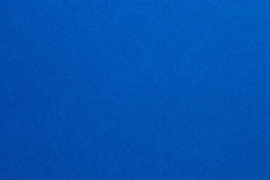 Küçük kare desenli mavi bir arka plan. Arkaplan çok açık mavi, desenli origami kağıt fon