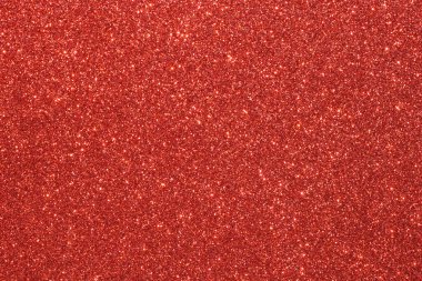 Parlak kırmızı noktalı kırmızı bir arka plan. Arka plan koyu kırmızı bir renktir, ve noktalar küçük ve parlaktır, parlak bir etki yaratır. Görüntünün çok fazla dokusu ve derinliği var.