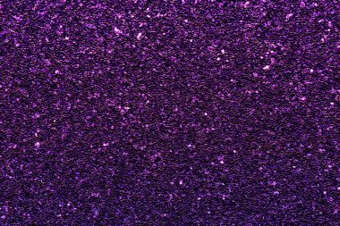 Pırıl pırıl mor bir arkaplan. Parıltı tüm arka plana saçılmış.