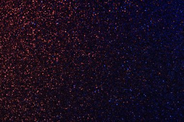 Mavi ve kırmızı bir arka plan yakın plan. Renkler parlak ve ışıltılar tüm görüntüye yayılmış.