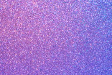 Bir sürü küçük mavi noktalı mor bir arka plan. Arka plan morun derin bir gölgesi ve noktalar görüntünün her tarafına dağılmış, derinlik ve doku hissi yaratıyor.