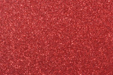 Parlak kırmızı noktalı kırmızı bir arka plan. Arka plan koyu kırmızı bir renktir, ve noktalar küçük ve parlaktır, parlak bir etki yaratır. Görüntünün çok fazla dokusu ve derinliği var.