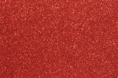 Parlak kırmızı noktalı kırmızı bir arka plan. Arka plan koyu kırmızı bir renktir, ve noktalar küçük ve parlaktır, parlak bir etki yaratır. Görüntünün çok fazla dokusu ve derinliği var.