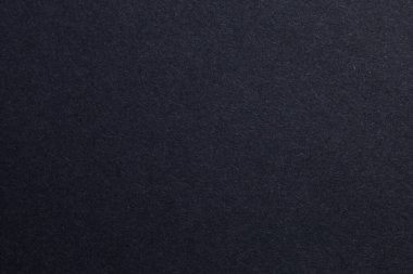 Bir sürü deseni olan siyah bir arkaplan. Doku çok ince ve arka plan neredeyse siyah, desenli origami kağıt fon.