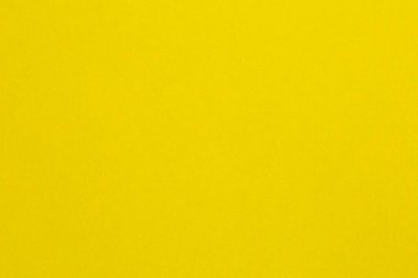 Beyaz çizgili sarı bir arka plan. Arkaplan, görüntünün ana odak noktasıdır, desenli origami kağıt arkaplanı