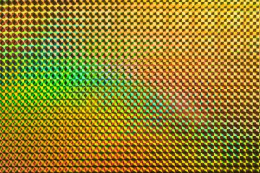 Renkli, farklı renklerde soyut bir desen. Kalıp kare ve çemberlerden oluşuyor.