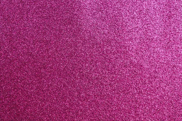 Pembe arka planda, etrafa saçılmış küçük beyaz noktalar. Arkaplan pembenin canlı bir tonudur, noktalar ise zıt beyaz renktedir. Görüntü çok neşeli.