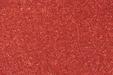 Parıltılı kırmızı bir arka plan. Arkaplan resmin ana odak noktasıdır