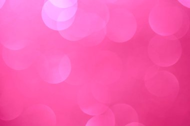 Pembe halkalı pembe arka plan. Çemberler bulanık ve örtüşüyor.