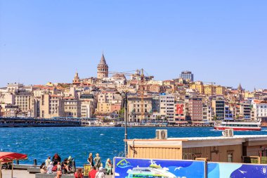 Scenic view of galata tower and cityscape by waterfront in istanbul. August 12, 2025 Istanbul Turkey.