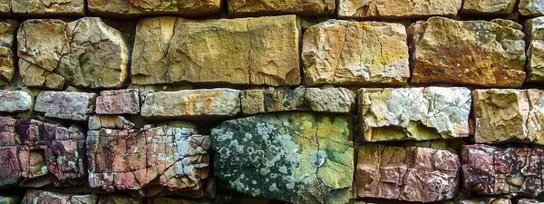 Stenen Textuur Kleurrijke Achtergrond Achtergrond Van Bakstenen Muur Gemaakt Van Rechtenvrije Stockfoto's