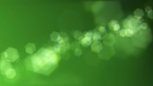Defocused Green Bokeh Lights Background Elegant Motion Animation Hexagonal Bokeh — Vídeo de Stock