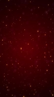 Dikey video - parlak parlak altın yıldızlar ve koyu kırmızı bir gradyan üzerinde bokeh parçacıkları. Bu zarif lüks arka plan tam bir HD ve kusursuz bir döngü..