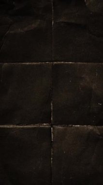 Dikey video - eski kağıt dokusu arka planı. Katlanmış kırışıklıkları ve film hasarı olan eski kağıtların hareket animasyonunu durdurun. Soyut grunge kağıt dokusu. Tam HD ve döngü.