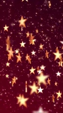 Dikey video - parlak altın yıldızlar ve parlak altın yıldız parçacıkları zarif kırmızı gradyan arka planda. Bu lüks animasyon ödül töreni ya da yetenek gösterisi için uygundur..