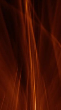 Dikey video - atmosferik arkaplan ve hızlı hareket eden altın ışık dalgaları. Tam HD ve döngü soyut arkaplan canlandırması.