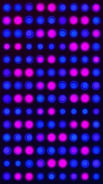 Dikey video - Pembe ve mavi neon renkli noktalar ve daireler veya LED ışıkları ile basit renkli hareketli arkaplan animasyonu.