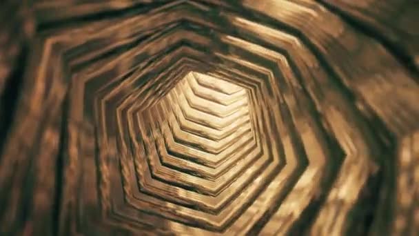 無限に回転する黄金の六角形のリングの空の明るい光沢のある金属のトンネルを通って飛びます フルHdとループゴールドカラー高級モーション背景アニメーション — ストック動画