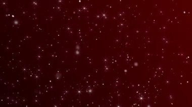 Parlak kırmızı bir Noel arkaplanı, beyaz parıldayan yıldızlar ve dönen kar parçacıkları. Tam HD ve döngülü lüks şenlik arka plan animasyonu.