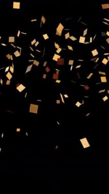 Altın konfeti patladı. Çerçevenin altından konfeti patladı. Sonra iki kez fırladı ve yere düştü. Kutlama konsepti. Şeffaf alfa kanalı ile video örtüşmesi.