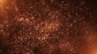 Işıldayan ateşli parçacıklar soyut arkaplan altın bokeh ışığı ve sığ alan derinliği ile. Bu sıcak, ışıltılı arka plan animasyonu tam bir HD ve kusursuz bir döngüdür..