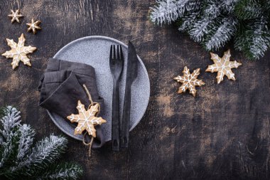 Christmas and New year table setting with gingerbread cookies