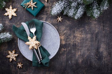 Christmas and New year table setting with gingerbread cookies