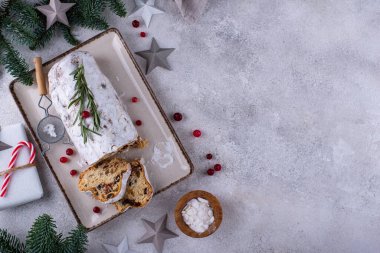 Stollen, traditional festive German Christmas cake with dried fruits