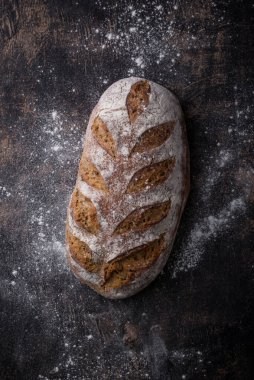 Fresh homemade bread with a crispy crust. Bakery concept