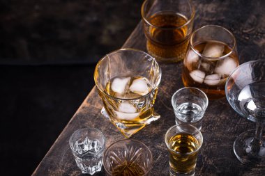 Assortment of strong alcohol drinks. Cognac, scotch, whiskey, tequila, vodka