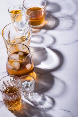 Assortment of strong alcohol drinks. Cognac, scotch, whiskey, tequila, vodka