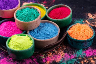 Gulal colors in bowl for celebrating Indian Holi festival