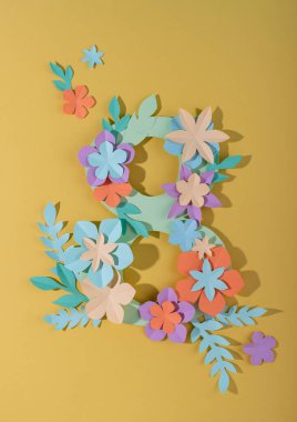 International Womens Day 8 March greeting card from flowers. Paper cut in pastel color