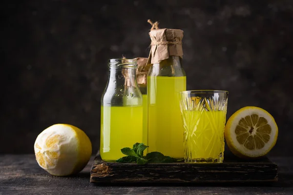 stock image Traditional italian limoncello or lemon liquor or homemade lemonade