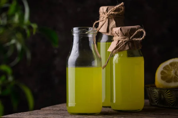 stock image Traditional italian limoncello or lemon liquor or homemade lemonade