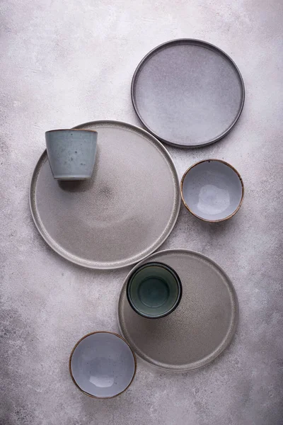 stock image Handmade craft ceramic tableware, plates, bowls and cups. Scandinavian style