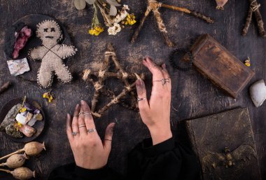 Voodoo doll. Black magic witch esoteric ritual. Halloween concept clipart