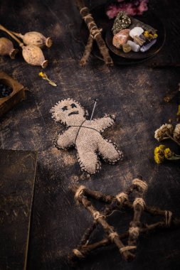 Voodoo doll. Black magic witch esoteric ritual. Halloween concept